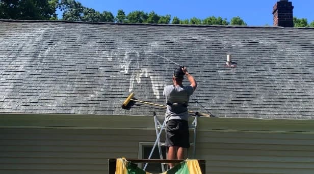 Before and after results of roof washing by Stow Power Washing in Stow